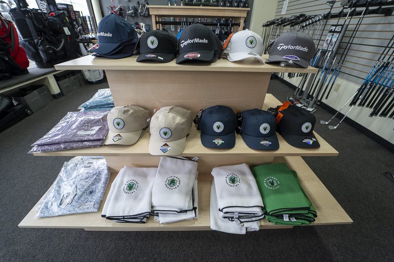 Hats and caps display, TaylorMade and GolfCube branded